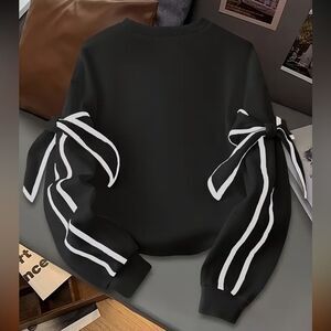 Black Bow Sleeve Women's Top with removable bows for versatile looks